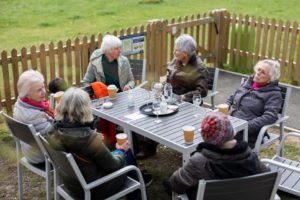 Residents of Detling sitting atDetling Community Store for Coffee morning